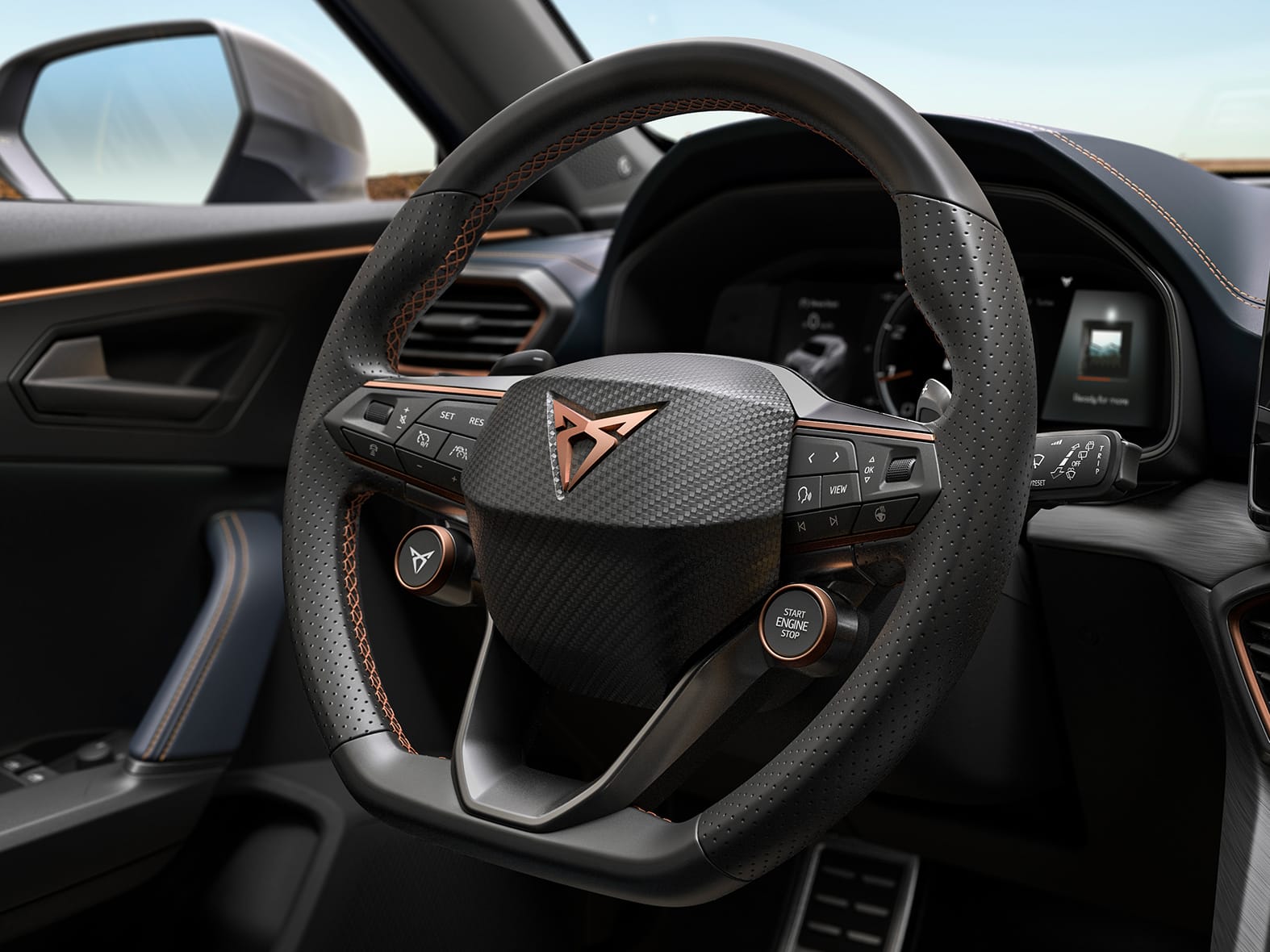 kompaktowy suv cupra formentor - koło kierownicy z przeszyciami w kolorze miedzi